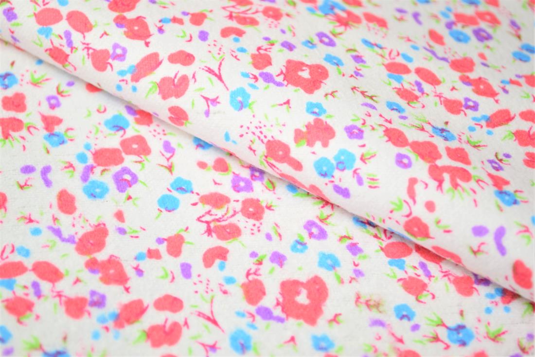 Floral Winceyette.
This print features small pink, purple and blue flowers. It would serve wonderfully in fashion or craft applications.
Winceyette, also referred to as brushed cotton or flannel, is ideal for nightwear, night dresses, pyjama bottoms, baby clothing, blankets and bedding. It is a soft material with a raised brushed surface (a nap), on both sides. 

Width: 43" 
Composition: 100% Cotton
