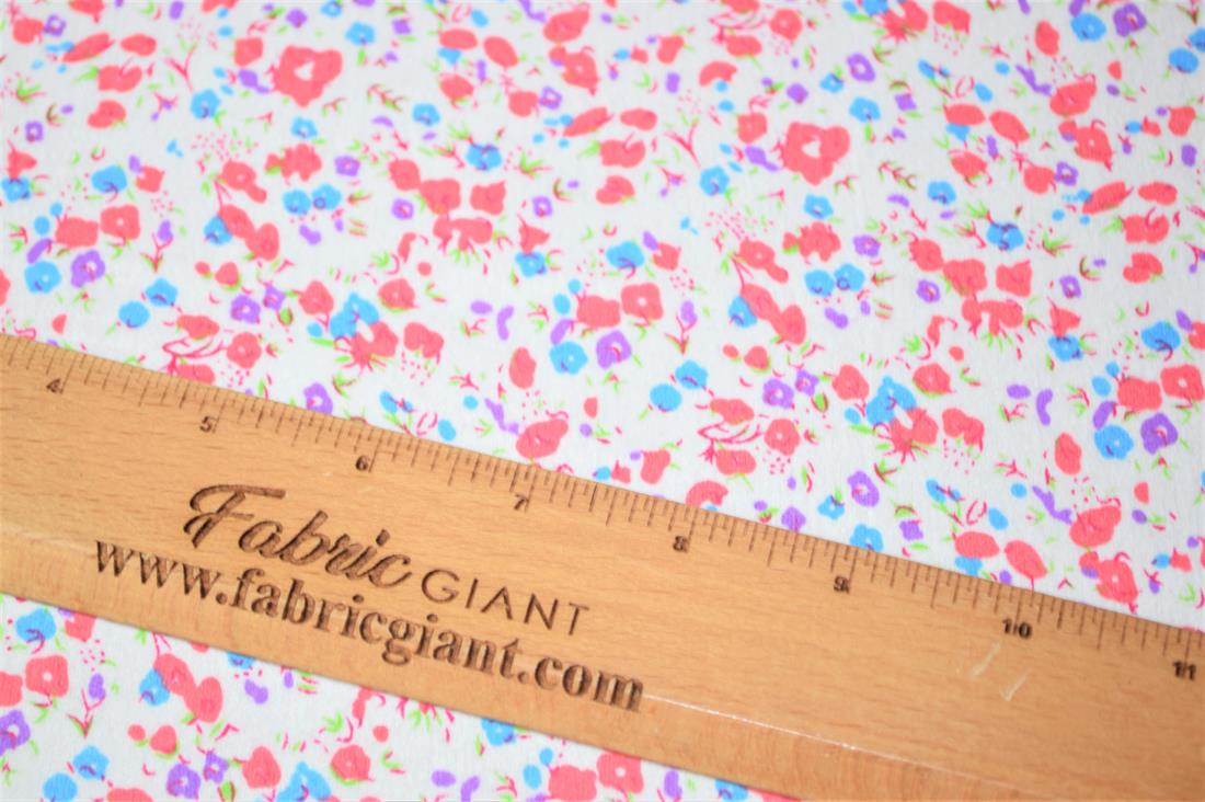 Floral Winceyette.
This print features small pink, purple and blue flowers. It would serve wonderfully in fashion or craft applications.
Winceyette, also referred to as brushed cotton or flannel, is ideal for nightwear, night dresses, pyjama bottoms, baby clothing, blankets and bedding. It is a soft material with a raised brushed surface (a nap), on both sides. 

Width: 43" 
Composition: 100% Cotton