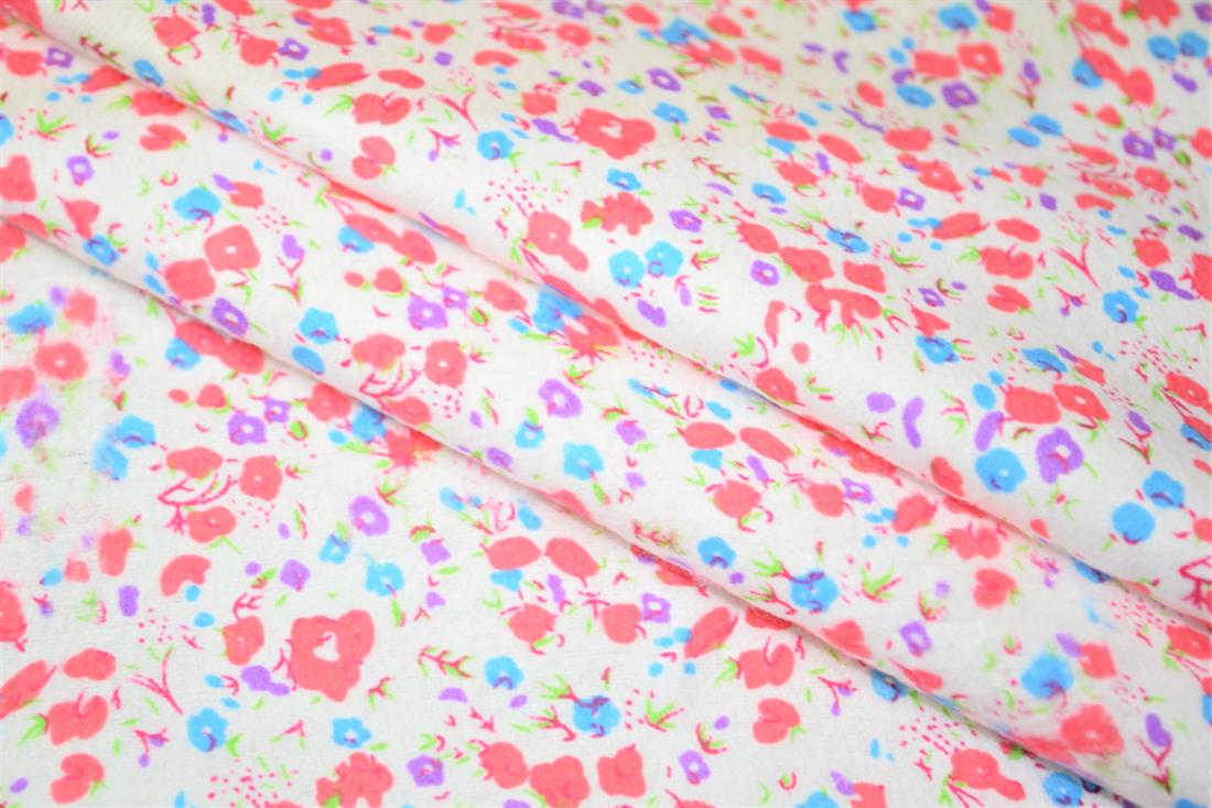 Floral Winceyette.
This print features small pink, purple and blue flowers. It would serve wonderfully in fashion or craft applications.
Winceyette, also referred to as brushed cotton or flannel, is ideal for nightwear, night dresses, pyjama bottoms, baby clothing, blankets and bedding. It is a soft material with a raised brushed surface (a nap), on both sides. 

Width: 43" 
Composition: 100% Cotton