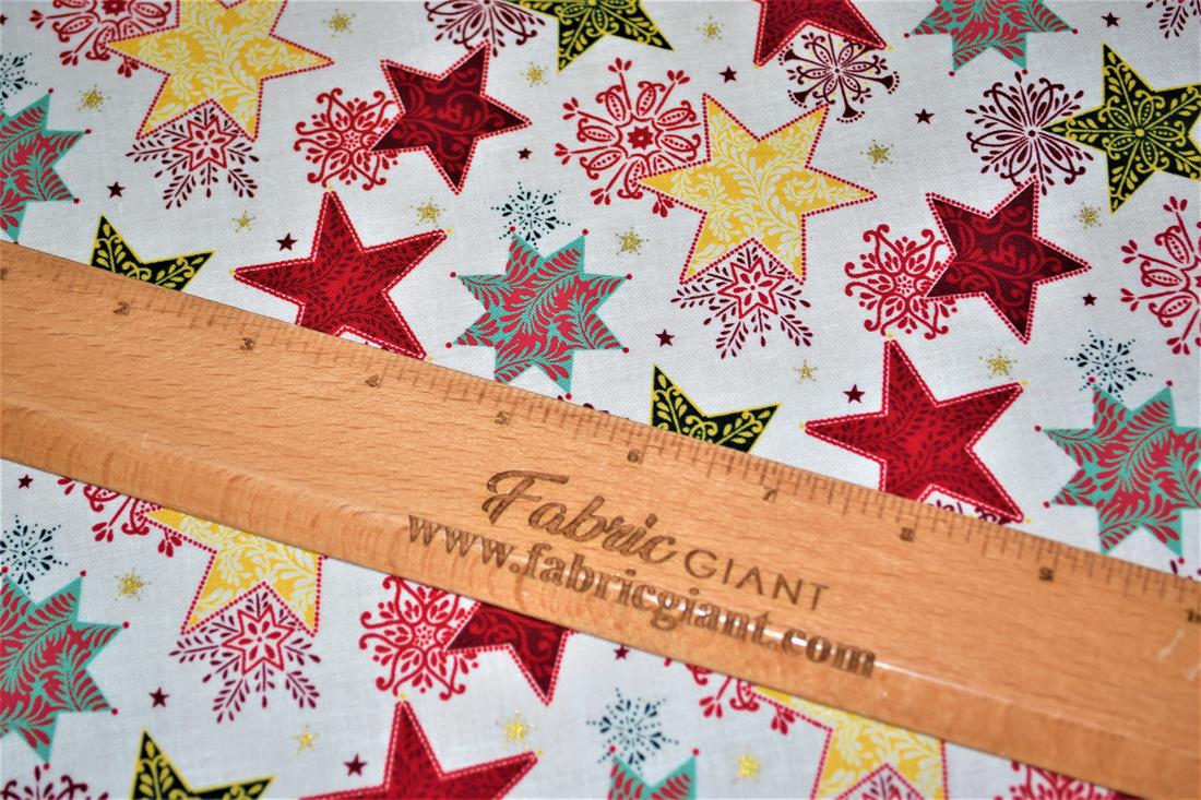 Christmas Fabric Stars print desing High Quality; This lovely fabric is great for dressmaking, quilting, patchwork, bed sheets, pillow cases, curtains, face masks/coverings, and for craft projects. Width 137cm, Composition 100% Cotton Washing - 30 degrees celsius Colours may slightly vary due to the lighting during the photo shooting or the monitor's display