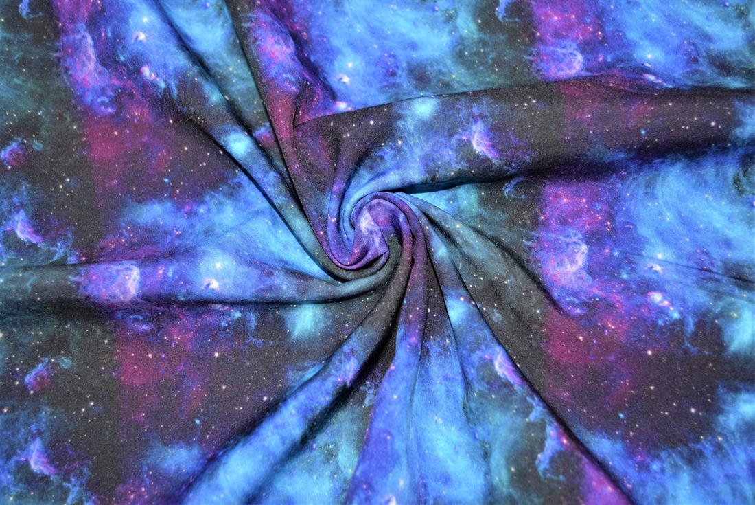 Dark Galaxy Soft Shell

This fabric is stellar!
Soft Shell Fleece is designed with a woven shower proof front and fleece backing fabric. It is wind & water resistant plus warm & breathable all of which make it an ideal outer fabric or perfect for layering with other clothing.
This soft shell fabric features an intergalactic, space design that is reminiscent of something from the bubble telescope. this space age design is very popular and contemporary and highlights cold purples, blues and greens.

Composition: 100% Polyester
Weight: 290gsm
Width: 58inch