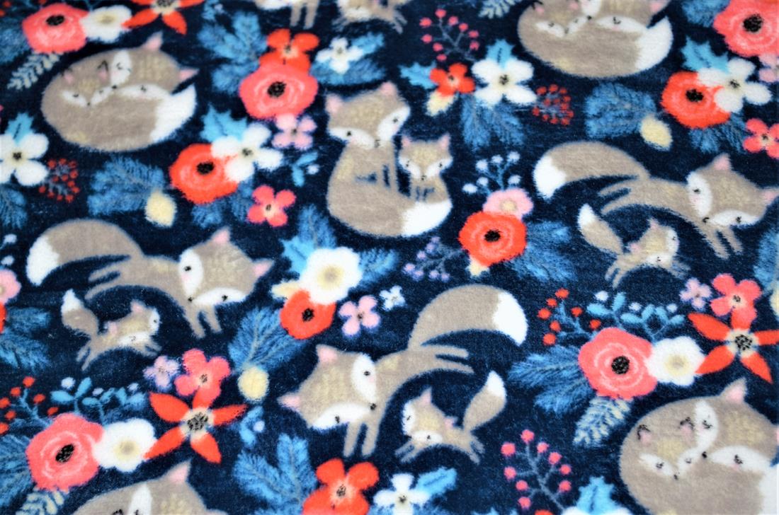 Forest Foxes  Smiley Stars Cuddle Fleece Print Cuddle Fleece is a soft luxurious fleece, perfect to use for animal beds, mittens, scarves, blankets, baby car seat covers, baby comforters, quilt backing, Jumpers, dressing gowns, cushion covers, hats and toys. This cuddle fleece features illustrations of an unlikely ensemble of animal friends; sheep, polar bears and penguins. The design is very cute, simplistic, wintery, fun and playful. Fleece is a synthetic insulating fabric made from a type of polyester. It is very comfortable due to its light weight and anti-perspiration qualities, and allows moisture to evaporate, while blocking humidity from the outside. Composition: 100% Polyester Weight: 240gsm Width: 57inch