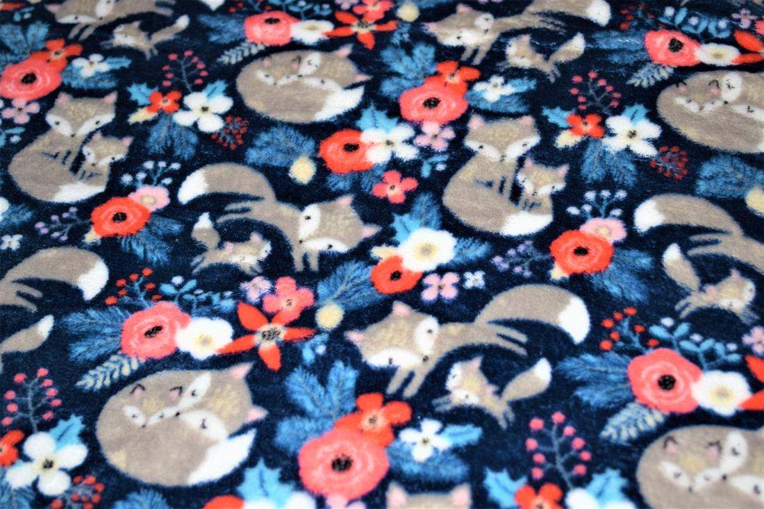 Forest Foxes  Smiley Stars Cuddle Fleece Print Cuddle Fleece is a soft luxurious fleece, perfect to use for animal beds, mittens, scarves, blankets, baby car seat covers, baby comforters, quilt backing, Jumpers, dressing gowns, cushion covers, hats and toys. This cuddle fleece features illustrations of an unlikely ensemble of animal friends; sheep, polar bears and penguins. The design is very cute, simplistic, wintery, fun and playful. Fleece is a synthetic insulating fabric made from a type of polyester. It is very comfortable due to its light weight and anti-perspiration qualities, and allows moisture to evaporate, while blocking humidity from the outside. Composition: 100% Polyester Weight: 240gsm Width: 57inch