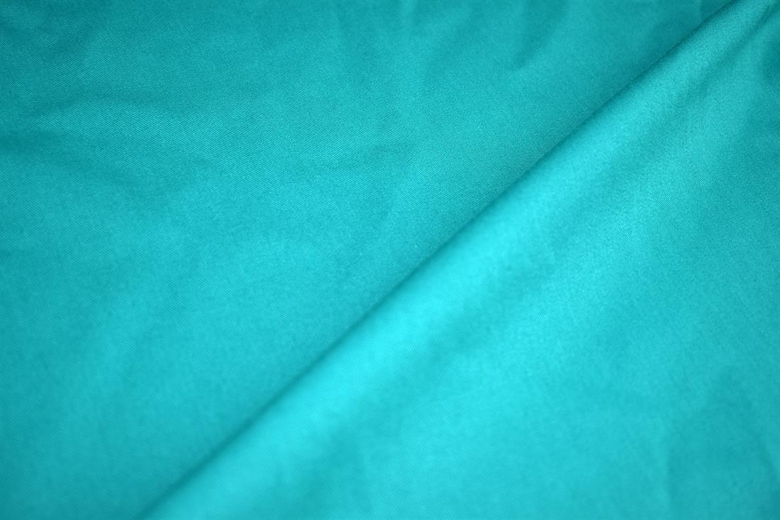 Turquoise - Plain Polyester Fabric, High Quality 
Perfect for Dressmaking, Tops, Skirts, Dancewear/ Costumes.
Colours may slightly vary due to the lighting during the photo shooting or the monitor's display. 
Width: 58"/ 148cm