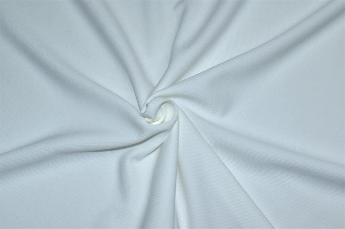 Ivory - Plain Polyester Fabric ( Soft Stretch Fabric) High Quality 
Perfect for Dressmaking, Tops, Skirts, Dancewear/ Costumes.
Colours may slightly vary due to the lighting during the photo shooting or the monitor's display. 
Width: 58"/ 148cm