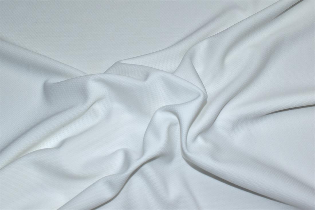 Ivory - Plain Polyester Fabric ( Soft Stretch Fabric) High Quality 
Perfect for Dressmaking, Tops, Skirts, Dancewear/ Costumes.
Colours may slightly vary due to the lighting during the photo shooting or the monitor's display. 
Width: 58"/ 148cm