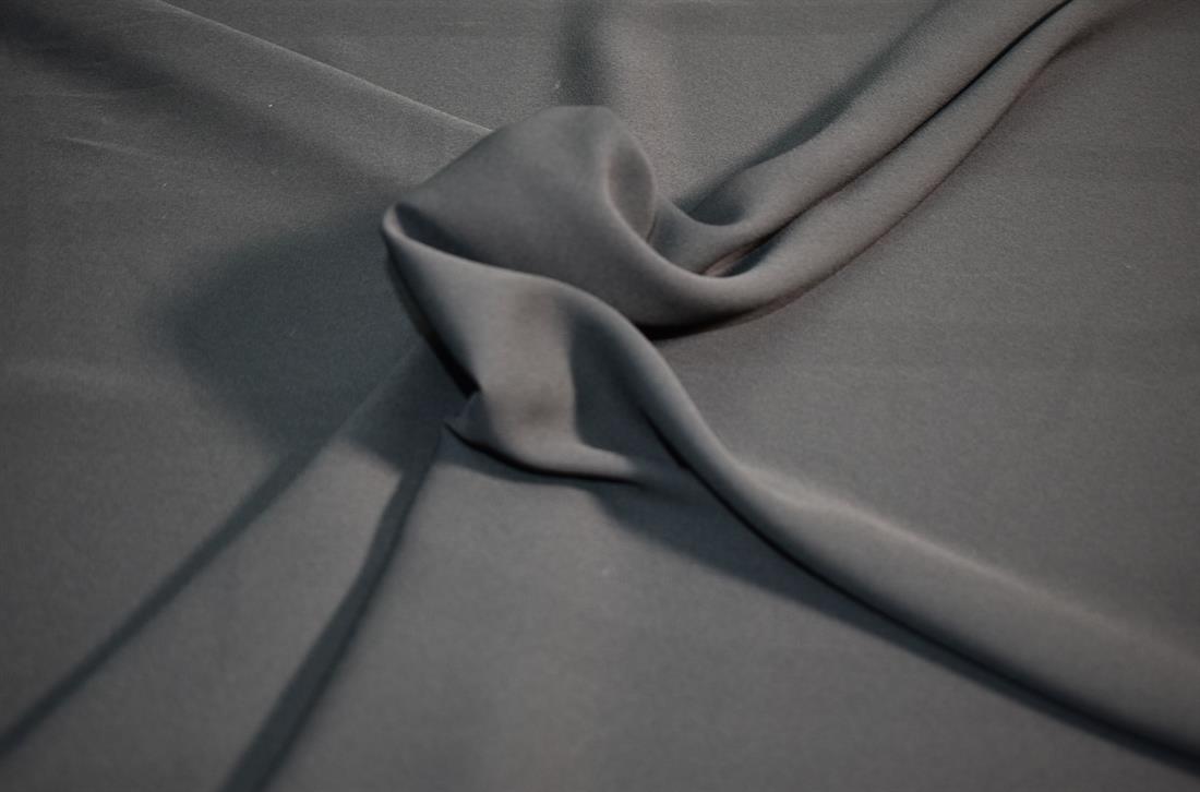 Black Plain Polyester  Fabric (see through Fabric)
Perfect for Dressmaking, Tops, Skirts, Dancewear/ Costumes.
Width: 57"/ 145cm
Colours may slightly vary due to the lighting during the photo shooting or the monitor's display.