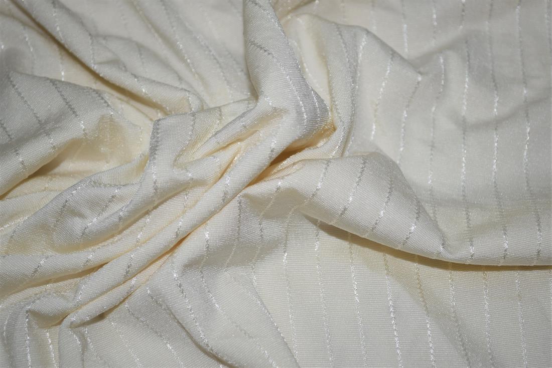 Cream Polyester Jersey fabric, 145cm wide, High Quality; Colours may slightly vary due to the lighting during the photo shooting or the monitor's display.